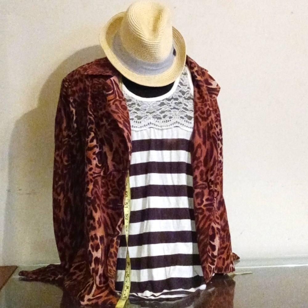 A sway leopard jacket and,coach tshirt.